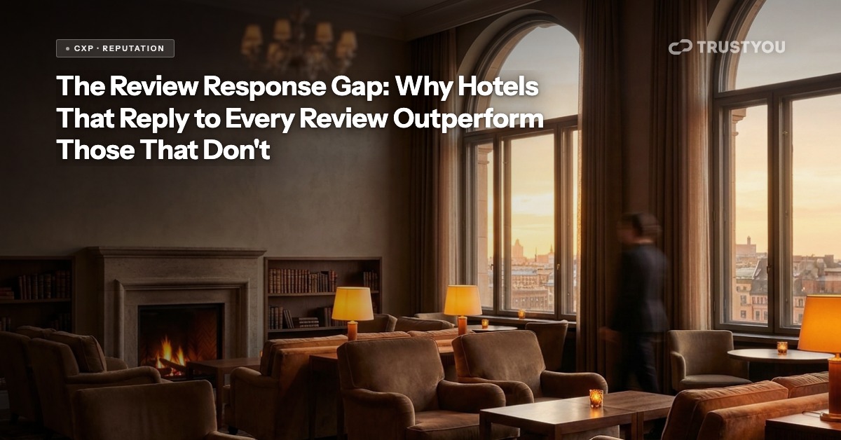 Hotel front desk manager reviewing guest feedback on a laptop — TrustYou CXP review response blog